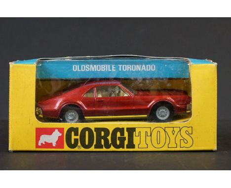 Boxed Corgi 276 Oldsmobile Toronado diecast model in metallic brown, cream interior, diecast excellent, gd box