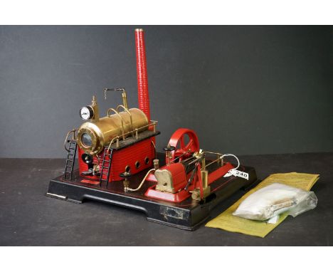 Wilesco D 21 Live Stationary Plant painted in red with brass fittings and detachable chimney, with information leaflet togeth