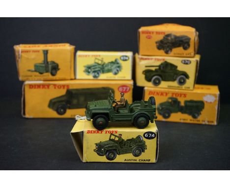 Seven boxed Dinky military diecast models to include 823 Cuisine Roulante, 673 Scout Car, 643 Army Water Tank, 677 Armoured C