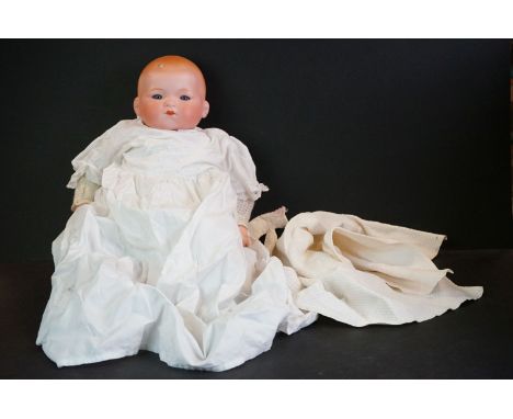 Early 20th C Armand Marseille bisque headed baby doll, sleeping glass eyes, some finger damge, composition body, marked AM 34