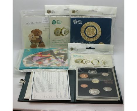 Royal Mint presentation sets to include 2002 Commonwealth Games coin set and two 'lucky silver pennies'. UK P&amp;P Group 1 (