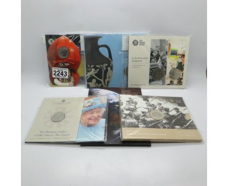 Six Royal Mint uncirculated packs, including one x £5 coin. UK P&amp;P Group 1 (£16+VAT for the first lot and £2+VAT for subs