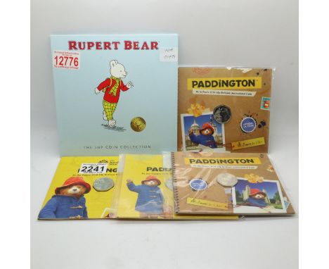 Four packs of Paddington uncirculated 50p's and one Isle of Man Rupert Bear set. UK P&amp;P Group 1 (£16+VAT for the first lo