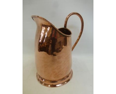 An early Victorian hot water pitcher with a dove tail seam.