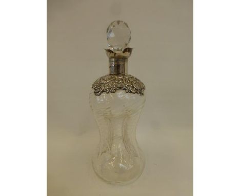 A good quality hour glass silver mounted glass decanter. Maker - Matthew John Jessop, Birmingham 1902.