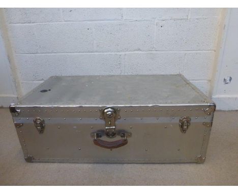 A German twin handled aluminium covered travel trunk. 