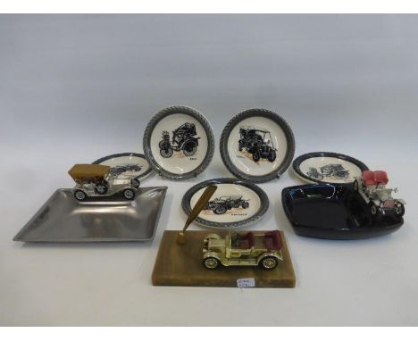 Five Wade veteran car series saucers, two vintage car ashtrays and a vintage car pen holder.