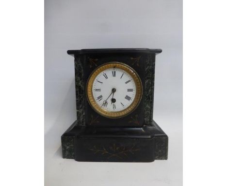 A 19th Century slate and marble mantle clock with French movement.