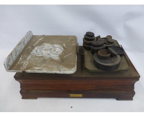 A set of mahogany and marble scales, the marble slab inscribed Parnell and Sons Ltd., Narrow Wine Street, Bristol.