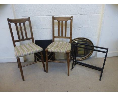 Two upholstered kitchen chairs, a gilt oval mirror, and a record deck wall shelf complete with metal wall bracket.