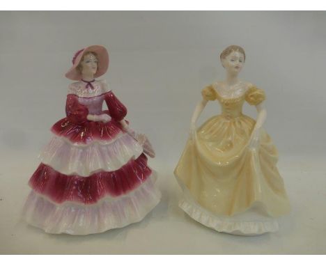 Two Coalport ceramic figurines from The Ladies of Fashion range - "Emily" and "Daphne".