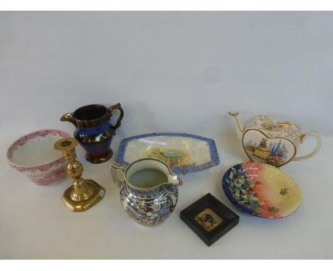 An assortment of mixed stet including a silver lustre jug and also a 19th Century brass candlestick.