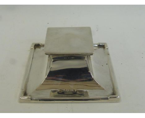 A silver desk top capstan inkwell. Maker -  A and J Zimmerman, Birmingham 1921, registered number 677726.