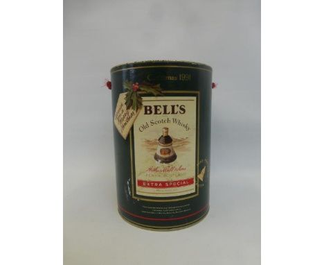 A cased Bells Scotch Whisky decanter Christmas edition 1991 with contents.