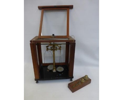 A cased set of Townsen and Mercer Croydon Laboratory scales and weights with a Wolters Balances, Watford plaque.
