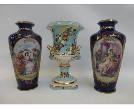A pair of Royal Vienna cobalt blue and gilt decorated vases with painted panels and a ceramic Italian pedestal base.