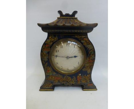 A good early 20th Century blue chinoisserie lacquered mantle clock of pagoda form with a guilloche style circular dial.