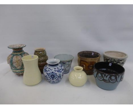 An assortment of ceramic vases, including Poole Pottery, West German and Quimper.