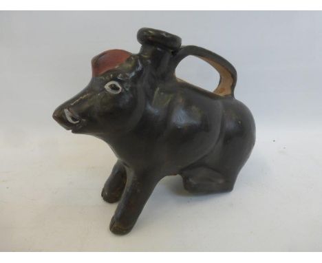A terracotta ASKOS water pitcher in the form of a seated boar with impressed Vatican seal to the underside.