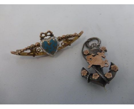 A 9ct gold and enamel bar brooch, and a silver and rose gold brooch in the form of an anchor.