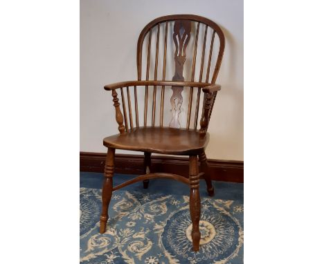 19th Century ash and elm two tier comb back Windsor armchair, with crinoline stretcher, back 100cm high, small crack to side 