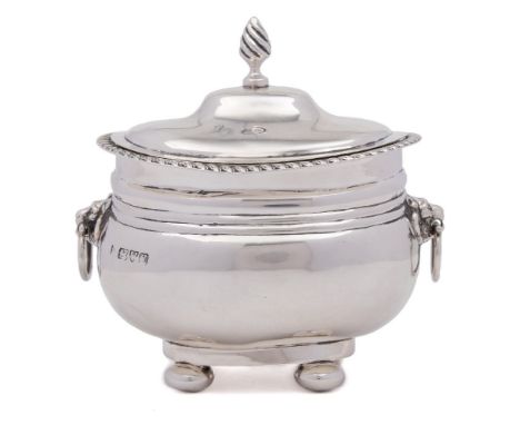 An Edward VII silver tea caddy, maker George Nathan & Ridley Hayes, Chester, 1904: of barge shaped outline, the hinged lid su