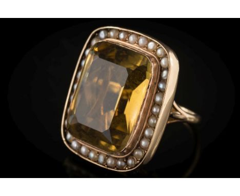 A rectangular citrine and cultured seed-pearl cluster ring:  the rectangular citrine approximately 20mm long x 17mm wide,  ap