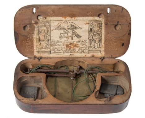 A pair of 18th century polished steel balance scales: with brass pans, contained in a fruitwood case with assorted weights, b