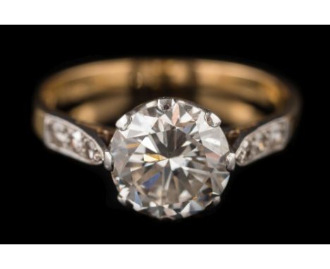 A diamond single-stone ring: the round brilliant-cut diamond approximately 8.2mm diameter x 5mm deep, estimated to weigh a to