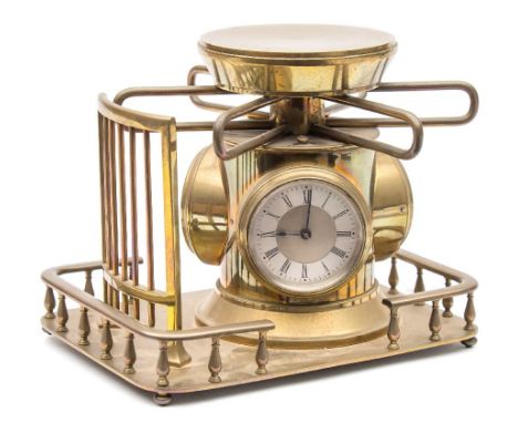 A French brass turnstile combined clock, thermometer and compass: the rotating turnstile set with an eight-day duration timep