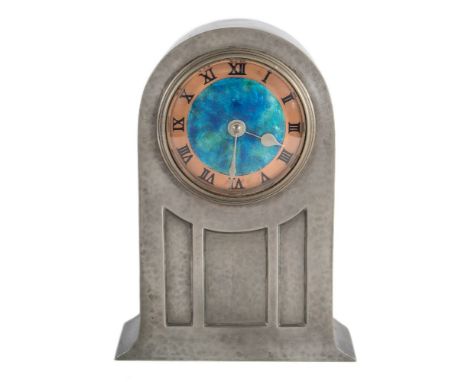 A Liberty &amp; Co Tudric pewter mantel clock: designed by David Veasey, London, circa 1902, the eight-day duration French ti