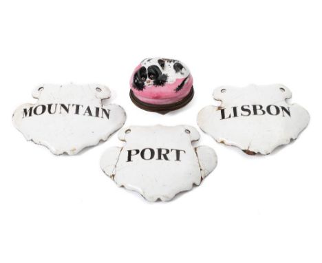 A Bilston enamel dog's head patch box and a set of three black on white enamel Port/Lisbon/Mountain decanter labels:  the fir
