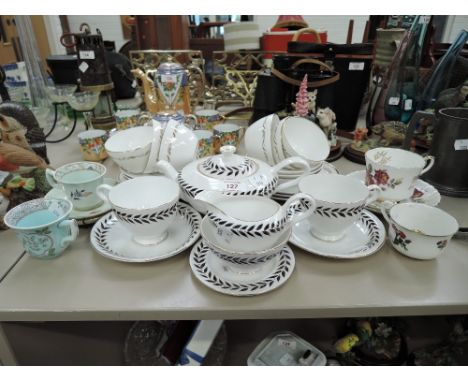 A selection of vintage tea cups and saucers including Royal Standard
