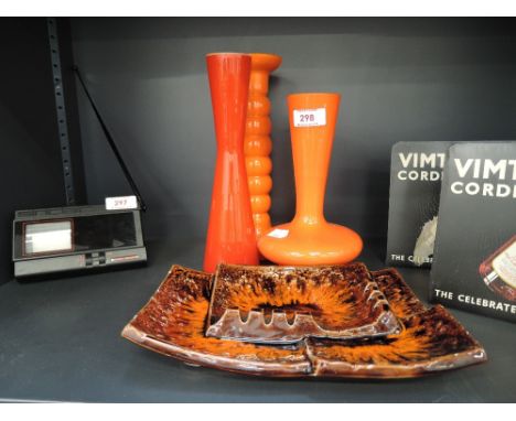 A selection of vintage orange 70's style glass wares and ceramic dish