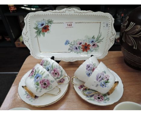 A selection of vintage tea cups and saucers
