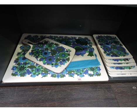 A selection of vintage un used melamine dinner matts and similar by St Michaels