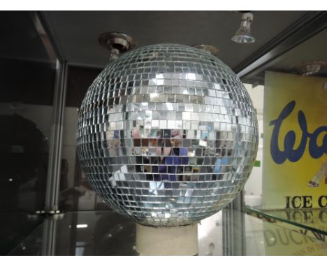 A vintage 1970's glitter disco ball approx 1ft across 