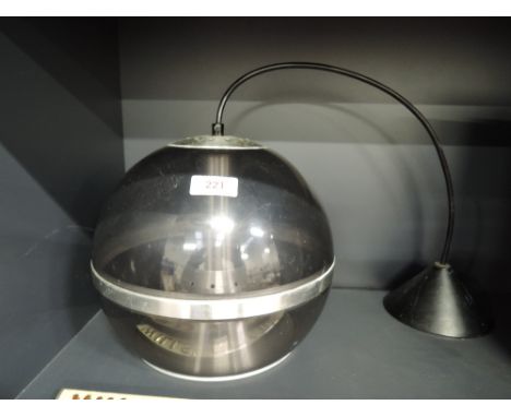 A vintage plastic UFO style ceiling light fitment