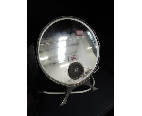 A vintage shaving mirror and lights by Harcourts