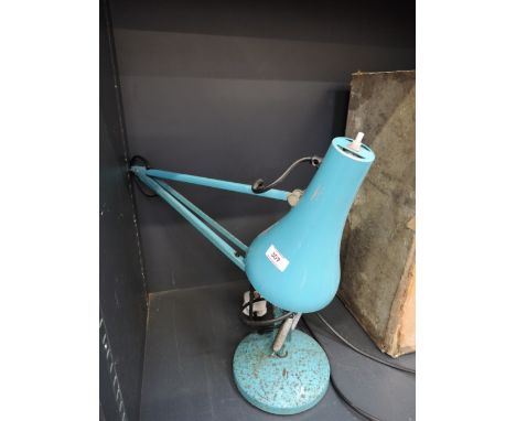 A vintage teal blue original angle poise lamp 