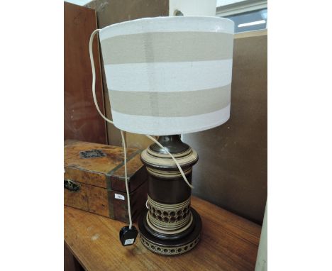 A vintage Jersey Pottery table lamp