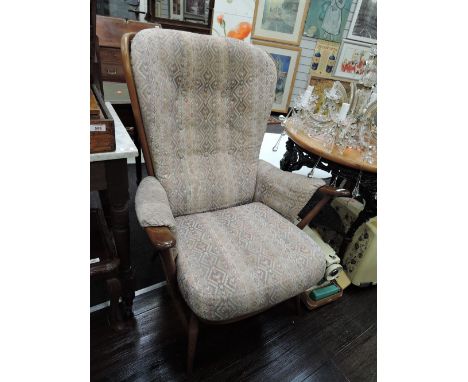 A vintage Ercol armchair in mid colour