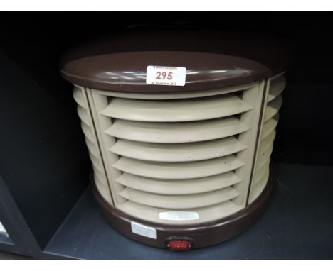 A vintage room heater by Morphy Richards with industrial design