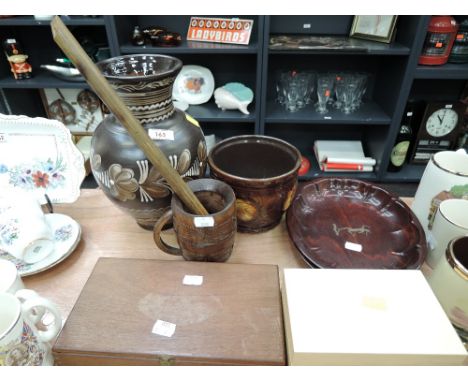 A selection of vintage treen decorations and ceramic vase