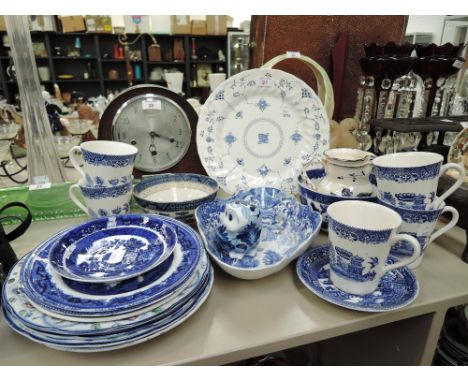 A selection of vintage blue and white ware ceramics including owl figure