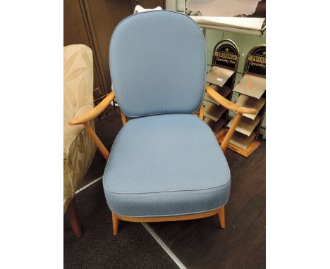 An Ercol style beech armchair