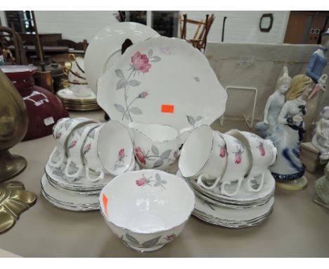 A vintage part tea service by Royal Albert in the Trent Rose pettern