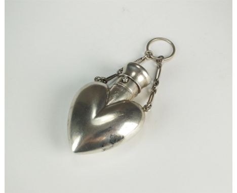 A Victorian heart shaped silver scent bottle, Sampson Mordan &amp; Co, London 1872, of plain polished form with push button m