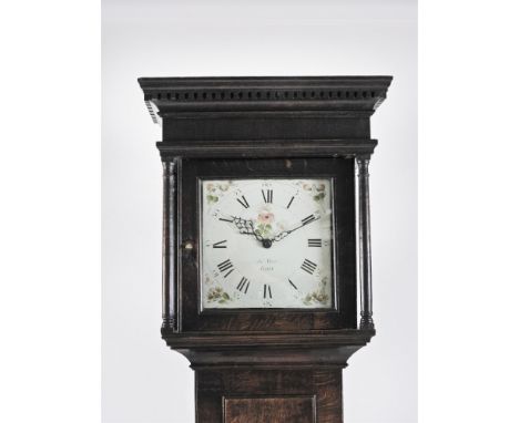 A George III country oak cottage longcase clock, the dentil mounded cornice above a square glazed door enclosing a 10” white 