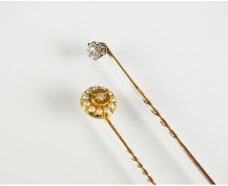 A diamond and seed pearl stick pin, together with a single stone old cut diamond stick pin (2)